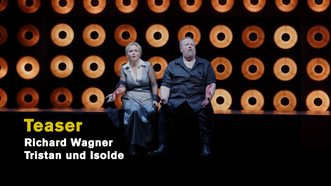 Tristan und Isolde – Ein Teaser - © Material Grand Théâtre de Genève, Ruth Tromboukis Eine Szenenimpression mit Tristan und Isolde als Standbild zum Teaser. Darauf die Worte: Teaser, Tristan und Isolde, Richard Wagner.